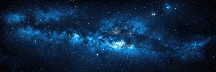 Obraz premium Stunning view of a nebula in deep space, showing swirling cosmic dust and gas clouds with bright stars.