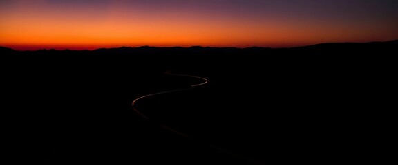 sunset over the road