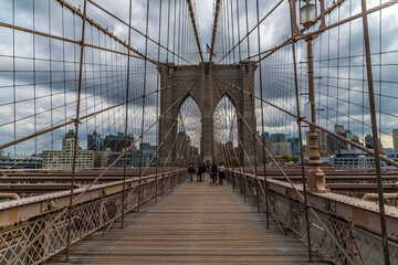 A view towards the Brooklyn end of the Brooklyn Bridge, New York, in the fall