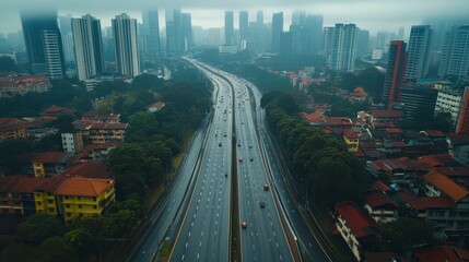 Obraz premium Aerial View of City Highway Traffic During Rainy Day Urban Landscape