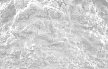 Empty rough light grey natural wet sand surface for abstract background and texture. beautiful patterns, space for work, banner, seamless wallpaper close up.