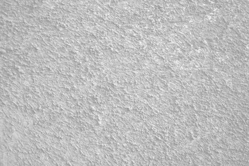Empty rough light grey natural wet sand surface for abstract background and texture. beautiful patterns, space for work, banner, seamless wallpaper close up.