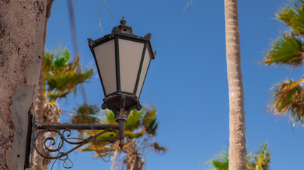 One of colonial lamps on a wall on the slave island of Goree, close to the Dakar, the capital of...