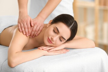 Fototapeta premium Relaxing Massage Therapy Session for Stress Relief and Wellness