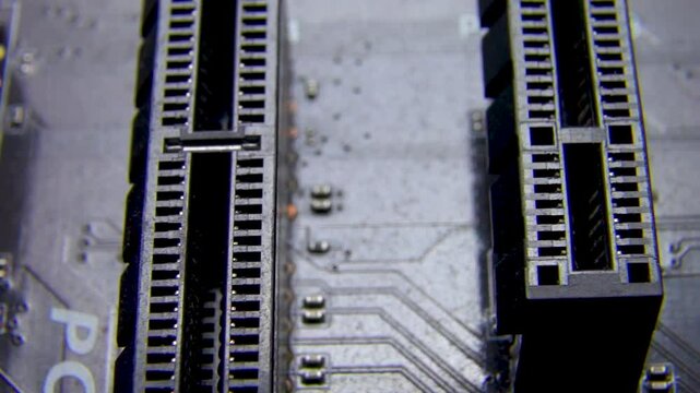 Close-up of a section of the printed circuit board showing memory slots