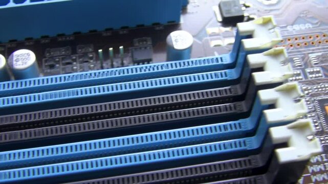 Close-up of a section of the printed circuit board showing memory slots