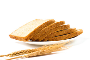 Sliced Wheat Bread on Plate with Wheat