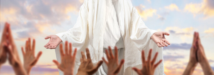 Man with open arms associated with the resurrection Savior Jesus Christ in a gesture of love and...