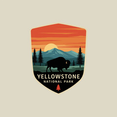 A stylized graphic depicting a bison silhouetted against a sunset over the mountains of Yellowstone National Park. © novianti