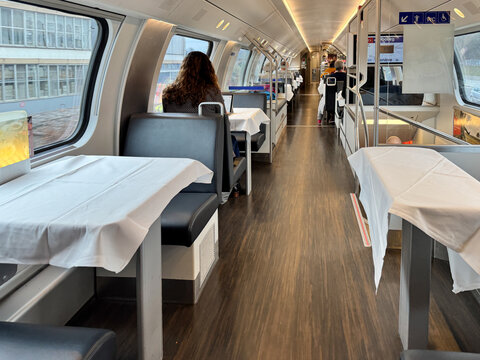 Basel, Switzerland - December 10, 2024: Inside a restauarnt dining car on a SBB Swiss train