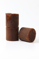 Close-up of Palm Sugar Cubes on White Background