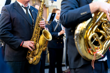 Obraz premium Band musicians with their instruments on the street. Typical music bands in Spain.