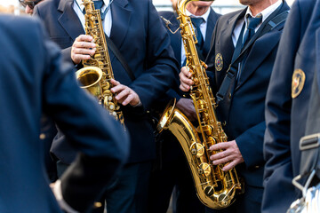 Naklejka premium Band musicians with their instruments on the street. Typical music bands in Spain.