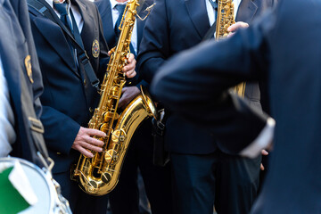 Naklejka premium Band musicians with their instruments on the street. Typical music bands in Spain.