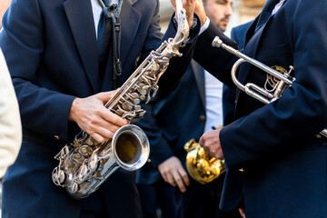 Band musicians with their instruments on the street. Typical music bands in Spain.