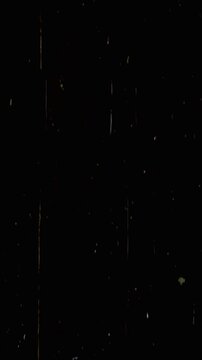 Vintage Movie Reel effect, featuring worn-out scratches and faded splotches on a vertical dark screen