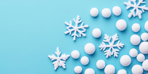 White Snowballs and Snowflakes on Blue Background