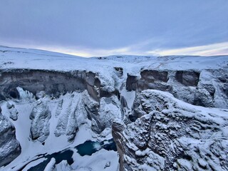 Snow-covered lava canyon