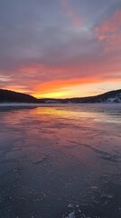 Serene Winter Sunset Over Icy Lake With Colorful Sky Reflections