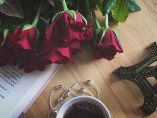 still life with rose and book