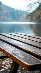 Fototapeta premium Tranquil Lake View with Rustic Wooden Table in Serene Landscape
