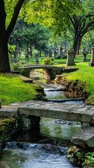 Serene Cemetery Landscape with Stream and Stone Bridge in Greenery