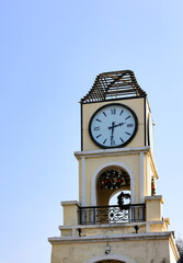 The clock tower with Decorate for the annual event background with blue sky.