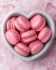 Fototapeta premium Valentine's Day Pink Macarons in Heart Bowl Sweet Treats Dessert Food Photography