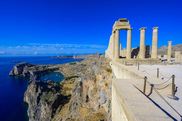 Acropolis at Lindos in paradise landscape scenery - travel destination on beautiful island Rhodes,...