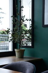 An unusual artificial potted Christmas tree