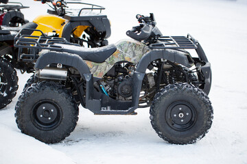ATV in winter. Off-road motor vehicles.