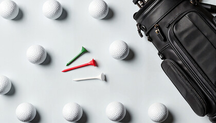 Golf balls and tees with black golf bag on clean background