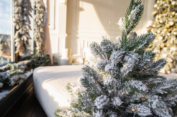 Elegant Christmas interior with a decorated tree, cozy seating, and soft natural light. Perfect for holiday themes, festive design, and seasonal inspiration
