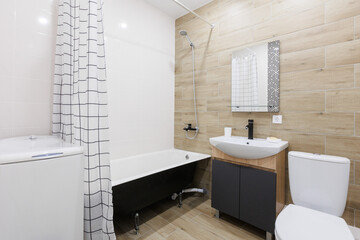 modern bathroom room with toilet and washing machine