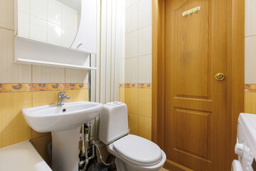 modern bathroom room with toilet and washing machine