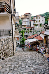 European Market sells local traditional clothes, fabrics on shelf of store