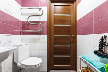 modern bathroom room with toilet and washing machine