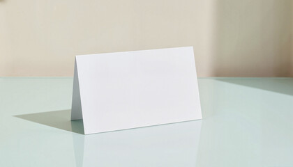 Naklejka premium Blank card on reflective surface, minimalistic design, mockup