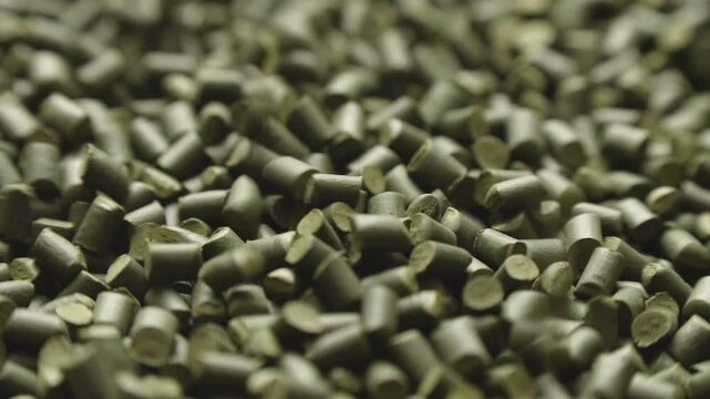 Green polymer dye in granules, background texture