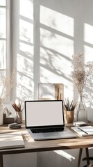 Fototapeta premium A minimalist workspace with a laptop.