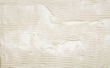 Abstract white beige color modeling clay and acrylic line wave painting wall. Canvas relief hand...