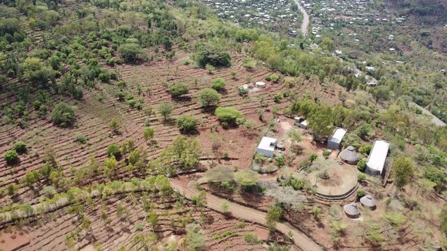 Aerial circling shot of the terraced hillsides of Konso, Ethiopia. The area is a UNESCO site for the ancient terraces that make farming possible in this arid area of Africa.