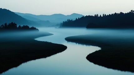 Obraz premium A body of water surrounded by trees in a foggy area with a river running through its middle is an ideal image to capture The lush greenery and misty surroundings add depth to