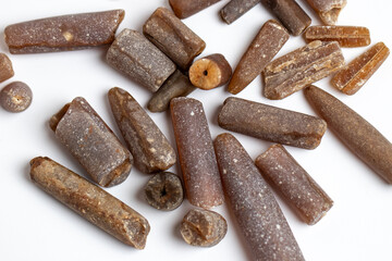 Belemnite Fossils on white background. Cretaceous period fossil