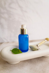 Hyaluronic acid serum in blue bottle 