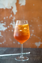 Cocktail aperol spritz on a table in restaurant  in Italy