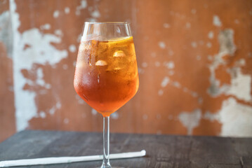 Cocktail aperol spritz on a table in restaurant  in Italy