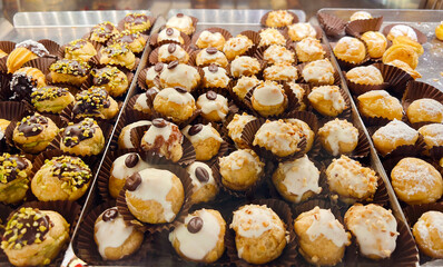Sweet pastry in window display in Italian bakery