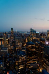 Fotobehang Stunning and Breathtaking Sunset View Over the Iconic Manhattan Skyline © vimpro