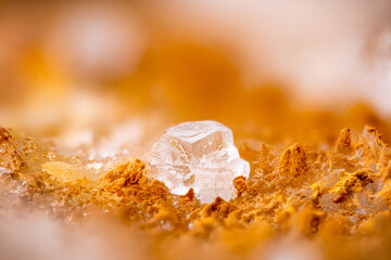 Colorless fluorite on oxide. Specimen from Maine, Lucenay-l'Évêque, France. Micro photography...